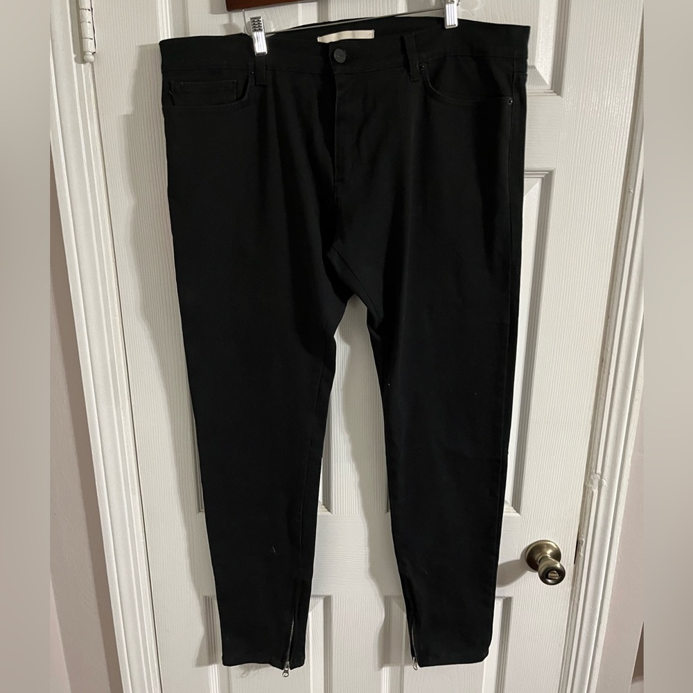 Golden brand black skinny jeans with red lightning bolt down leg